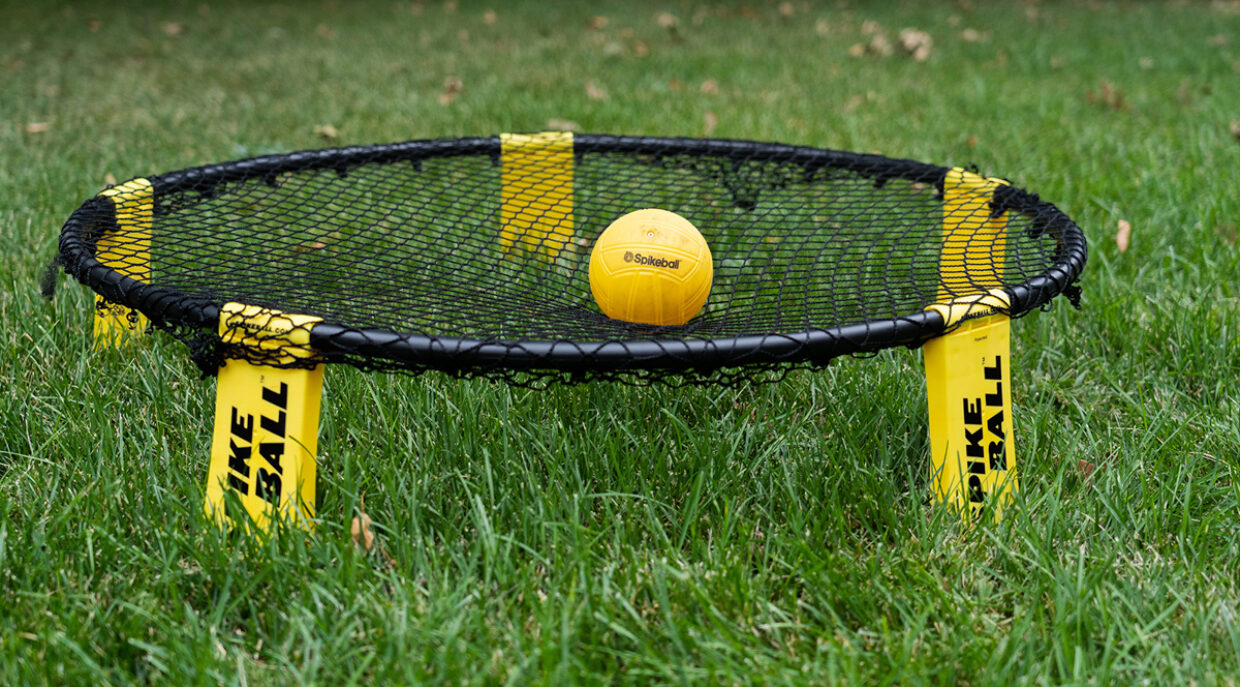 A spikeball set on grass